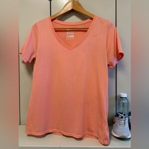 The NikeTee Women's Coral V-Neck Short Sleeve Dri-fit